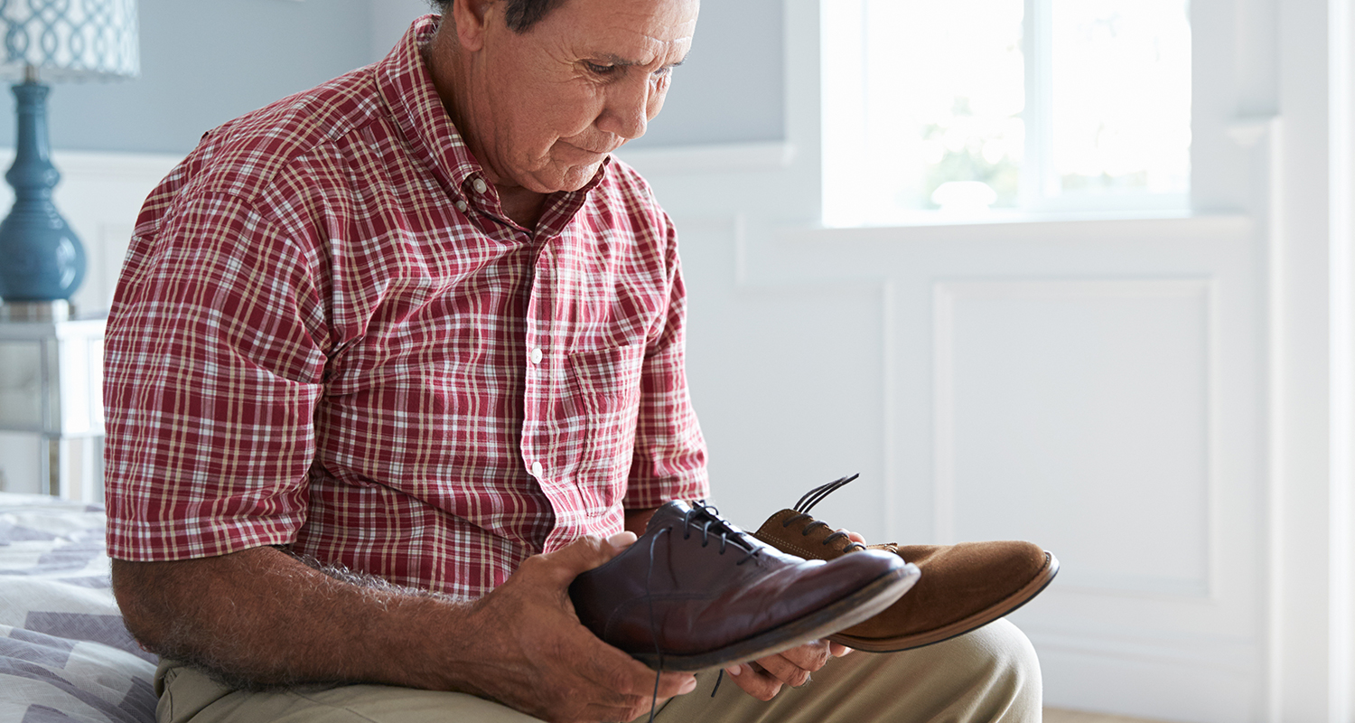 Person with moderate dementia receiving care