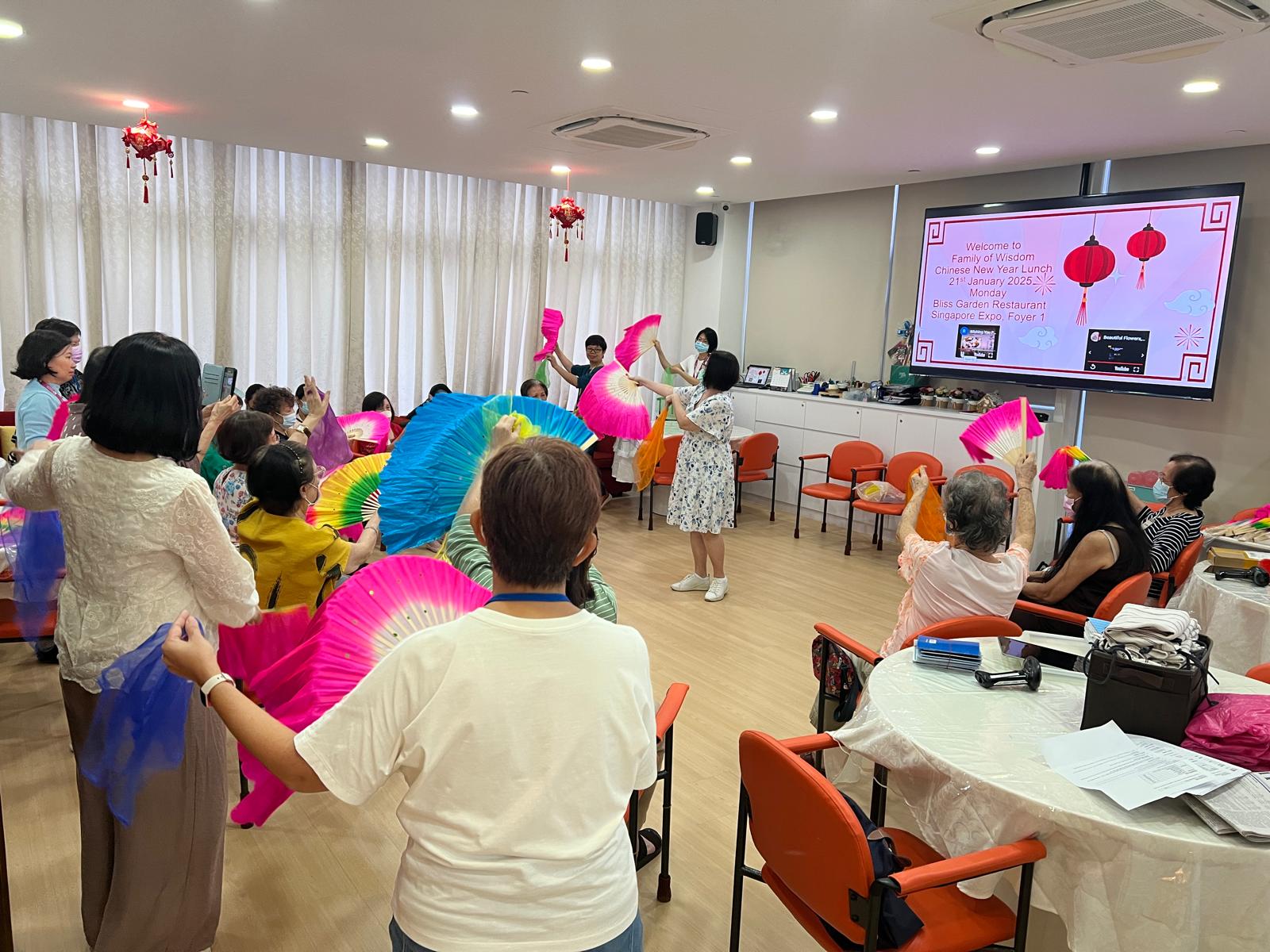 Clients and staff at the Family of Wisdom annual CNY lunch